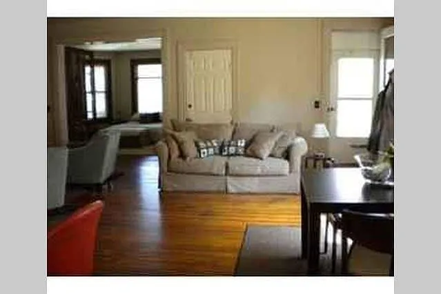 Shiney 100 year hardwoods throughout
