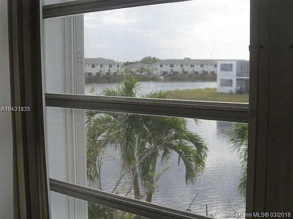 3rd image of 100 NE 203rd Ter APT 23-F