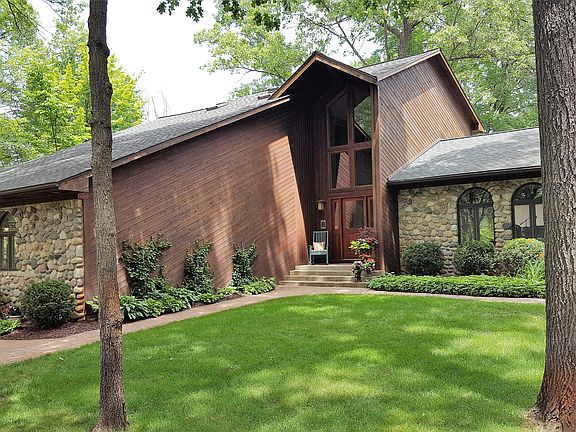 Cedar & cobblestone exterior