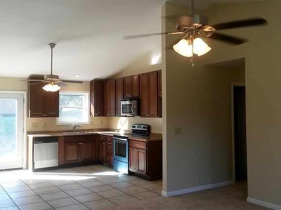 Open floorplan, tile, carpet