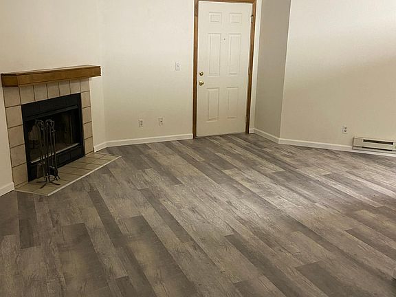 Wood burning fireplace for cozy winter days.