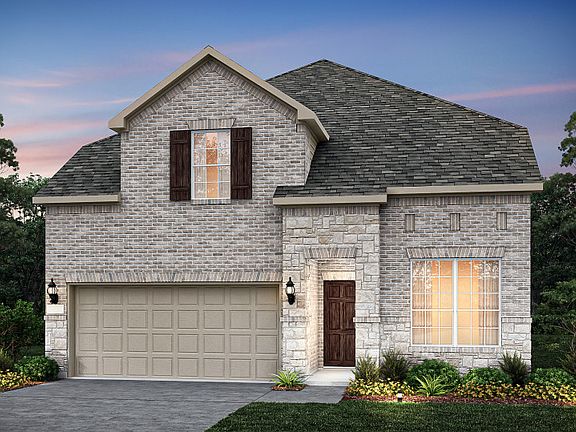 The Riverdale, a two-story home with 2-car garage, shown as Home Exterior C.