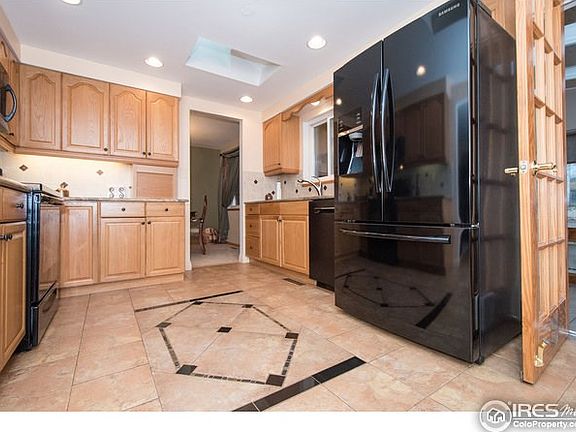 Plenty of cabinetry & mix of high end appliances.