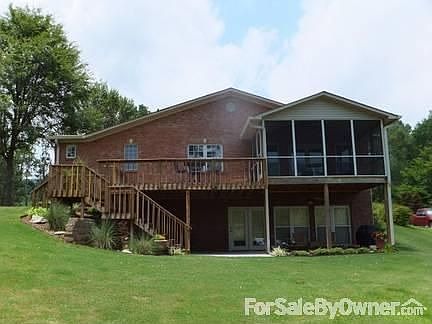 Lakeside View of Home
						:
						Enjoy the view of the lake from the upper deck, screened-in porch or the patio.