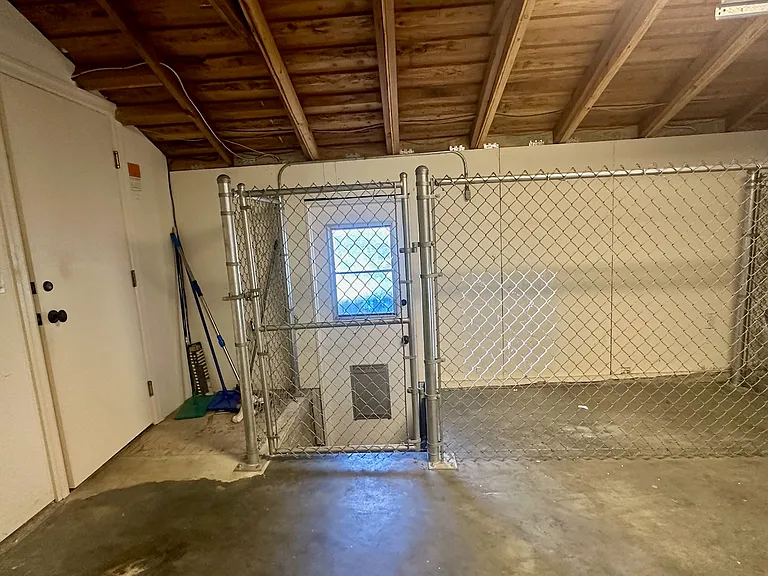 Dog run is outside, through gated area.