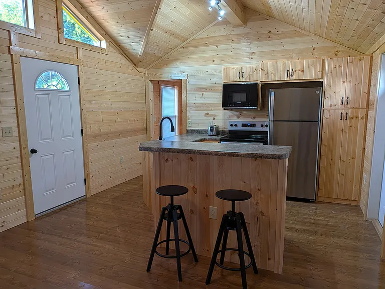 Living room with view of kitchen