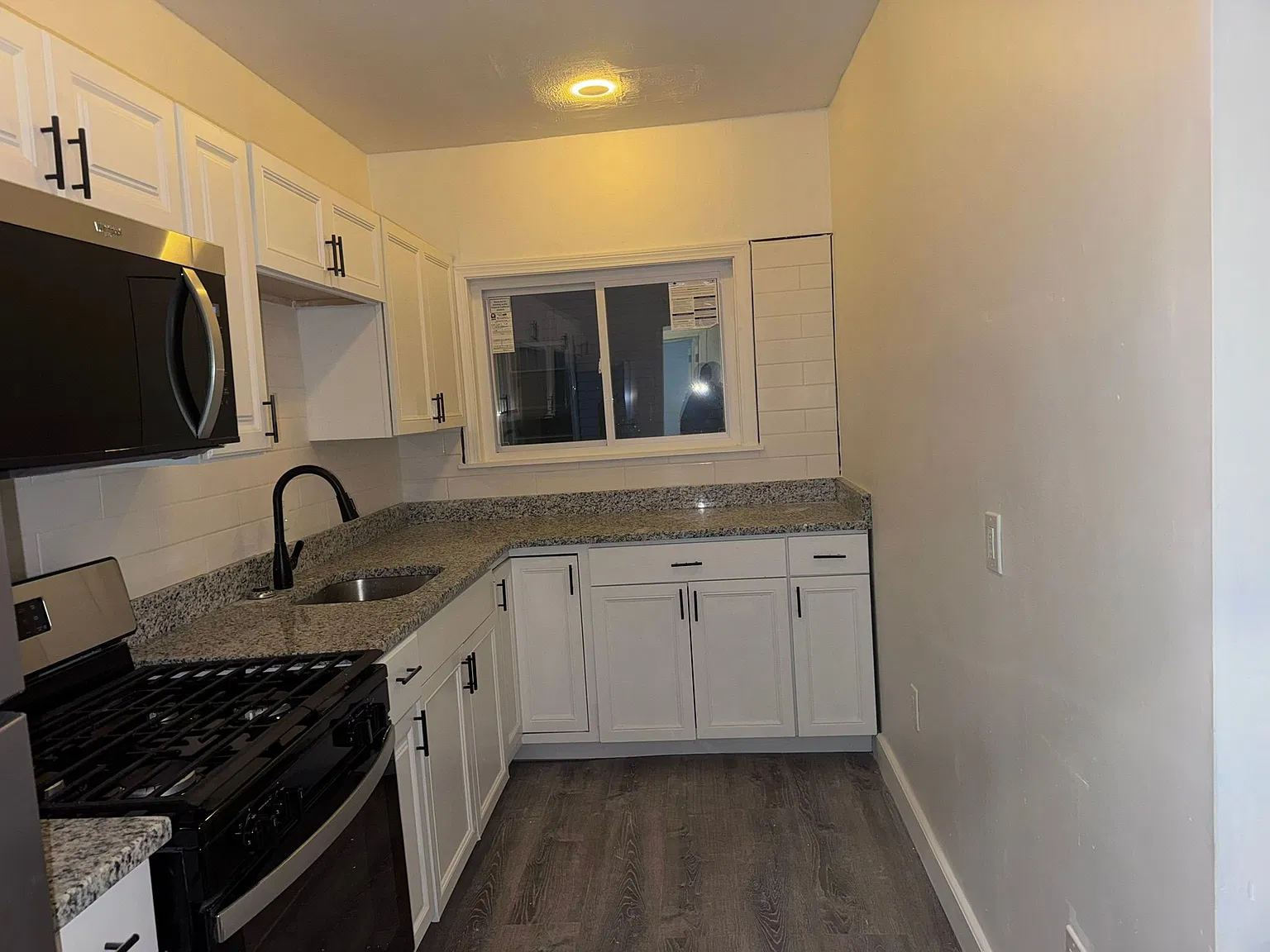 Recently Renovated 4BR/1BA with New Appliances & Parking Available Oct 26! — Photo 4