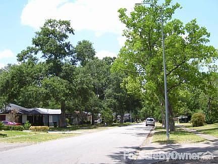 Street : Street light to the right is front sidewalk of house.