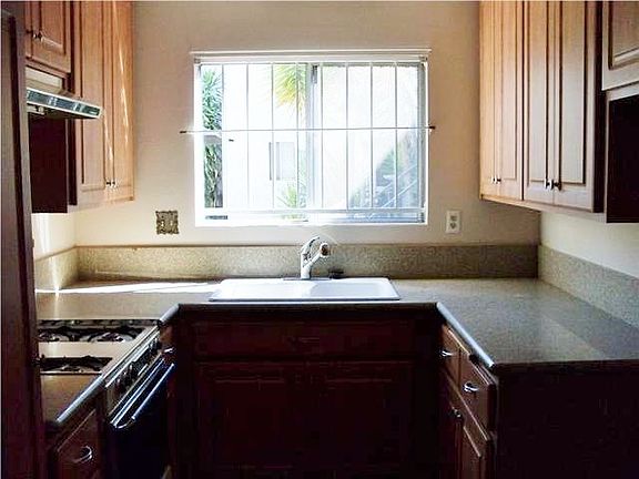Upgraded counter tops and cupboards.  Kitchen window security bars removed.