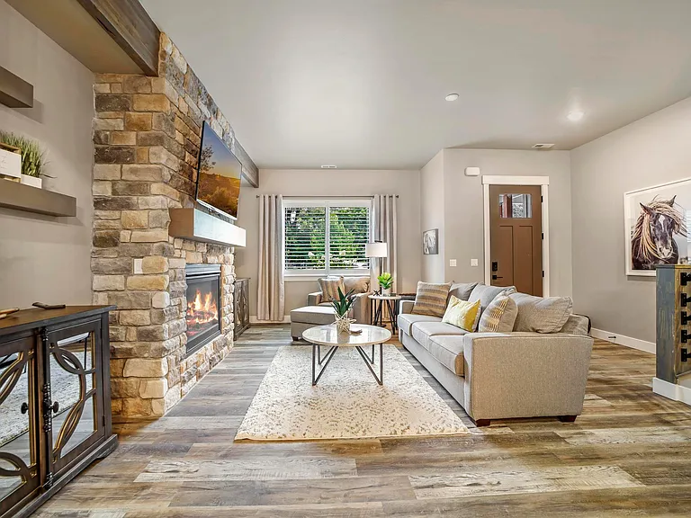 Living Room With Gas Fireplace With Custom Rock
