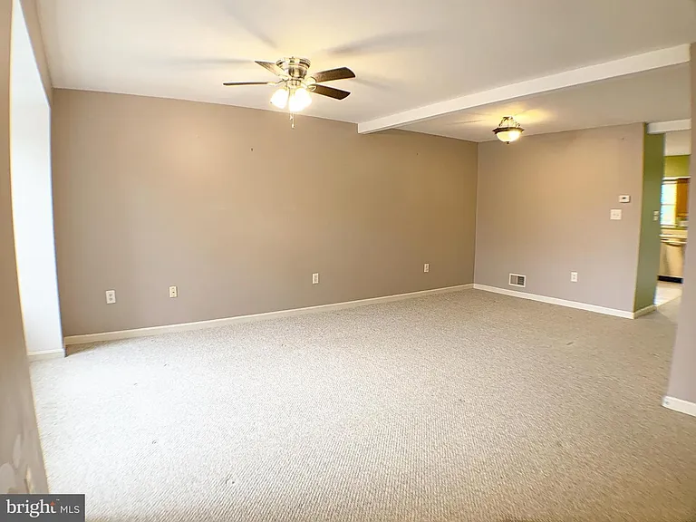 Main level: Living room with open dining space