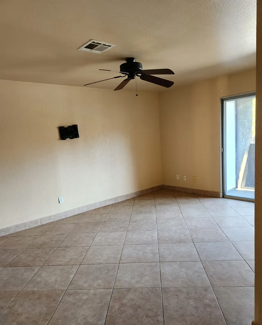 Welcome to this second floor condo in a gated community! — Photo 1