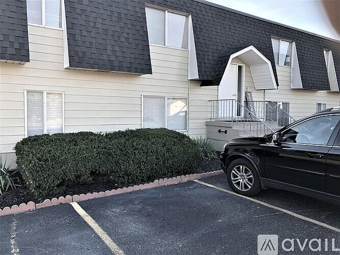 Entrance to apartment building from parking lot.