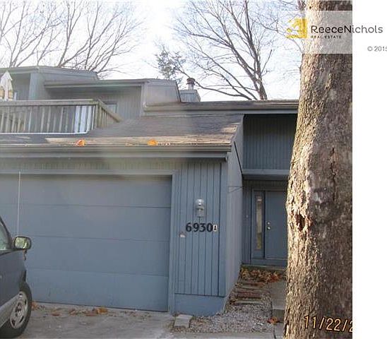 Two Story Unit with 2 car garage and upper deck.