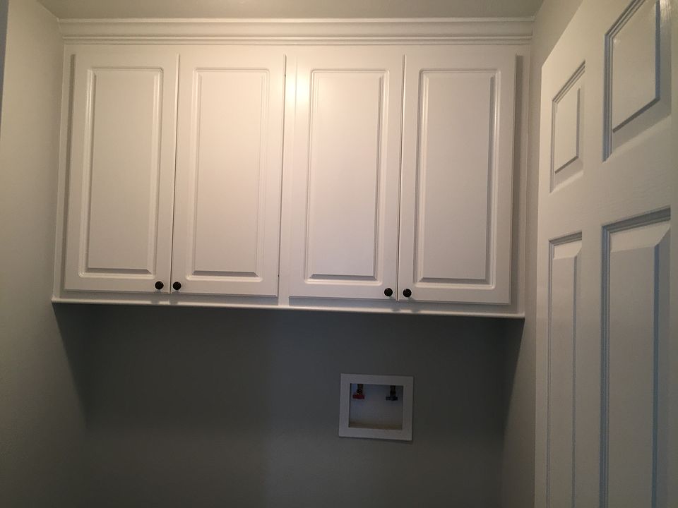 Laundry w/custom cabinets
