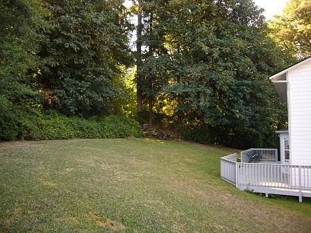 The extra large lot backs to a greenbelt for privacy and solitude