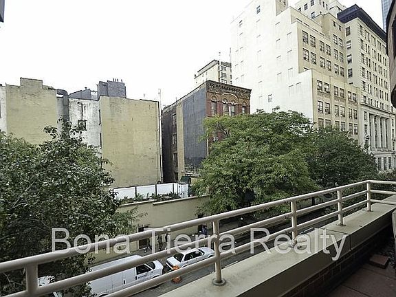 5th image of 393 W 49th St APT 3T