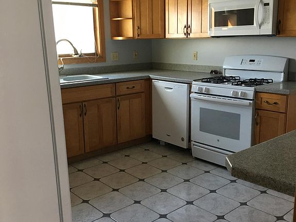 Real wood cabinets, gas range, dishwasher, microwave