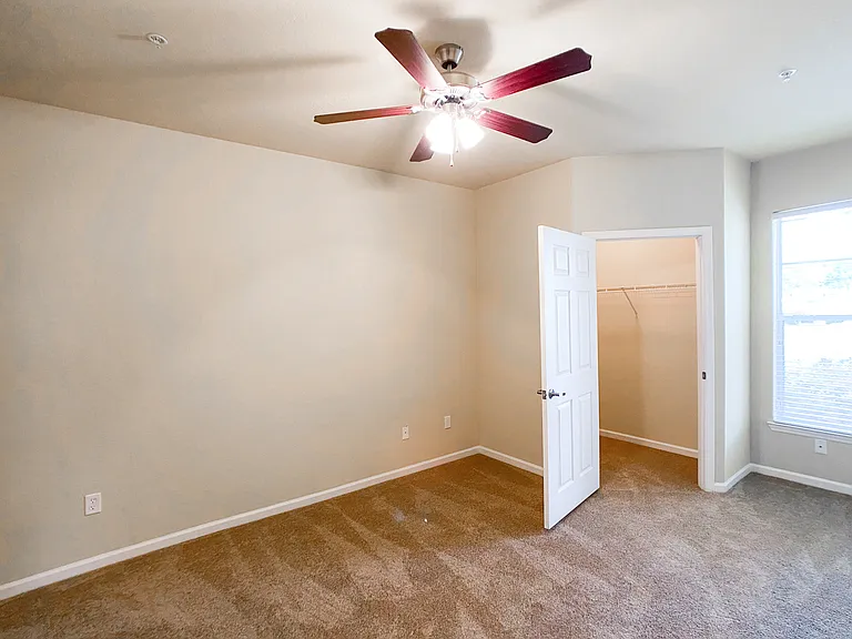 Large Bedroom with Lush Carpet and Walk In Closet Large Bedroom with Lush Carpet and Walk In Closet