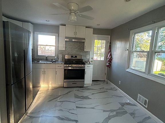 Kitchen with view from livingroom