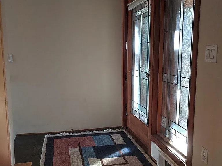 Slate front entry. Rug has been removed