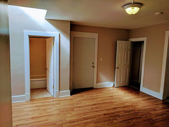 Dining room showing the skylight on the left. Left door ente