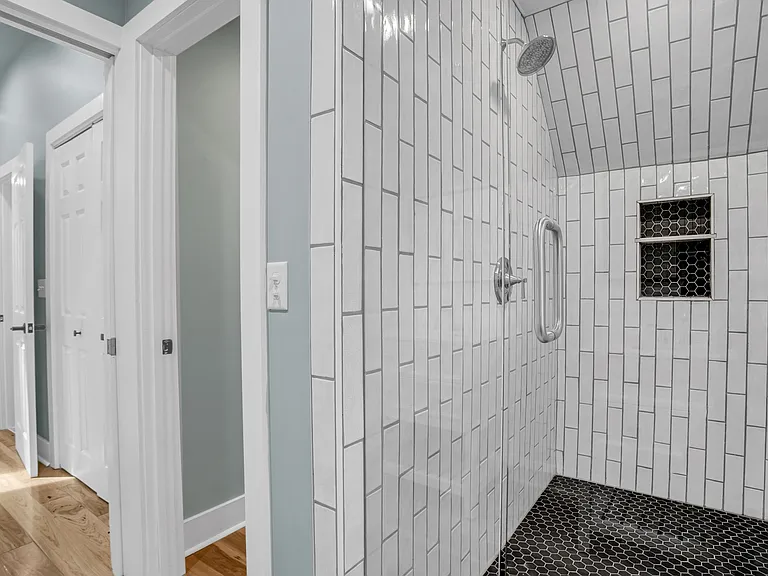 Upstairs shower with high end tilework