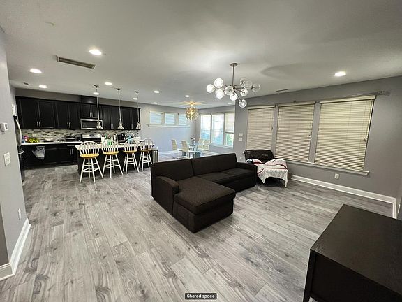 Big living room space with open kitchen and dining table ..come along with the furniture you see