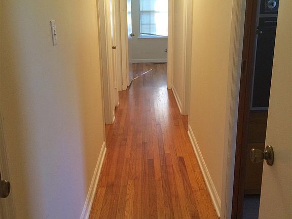 Long hallway, with linen closet