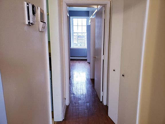 Hallway with closets