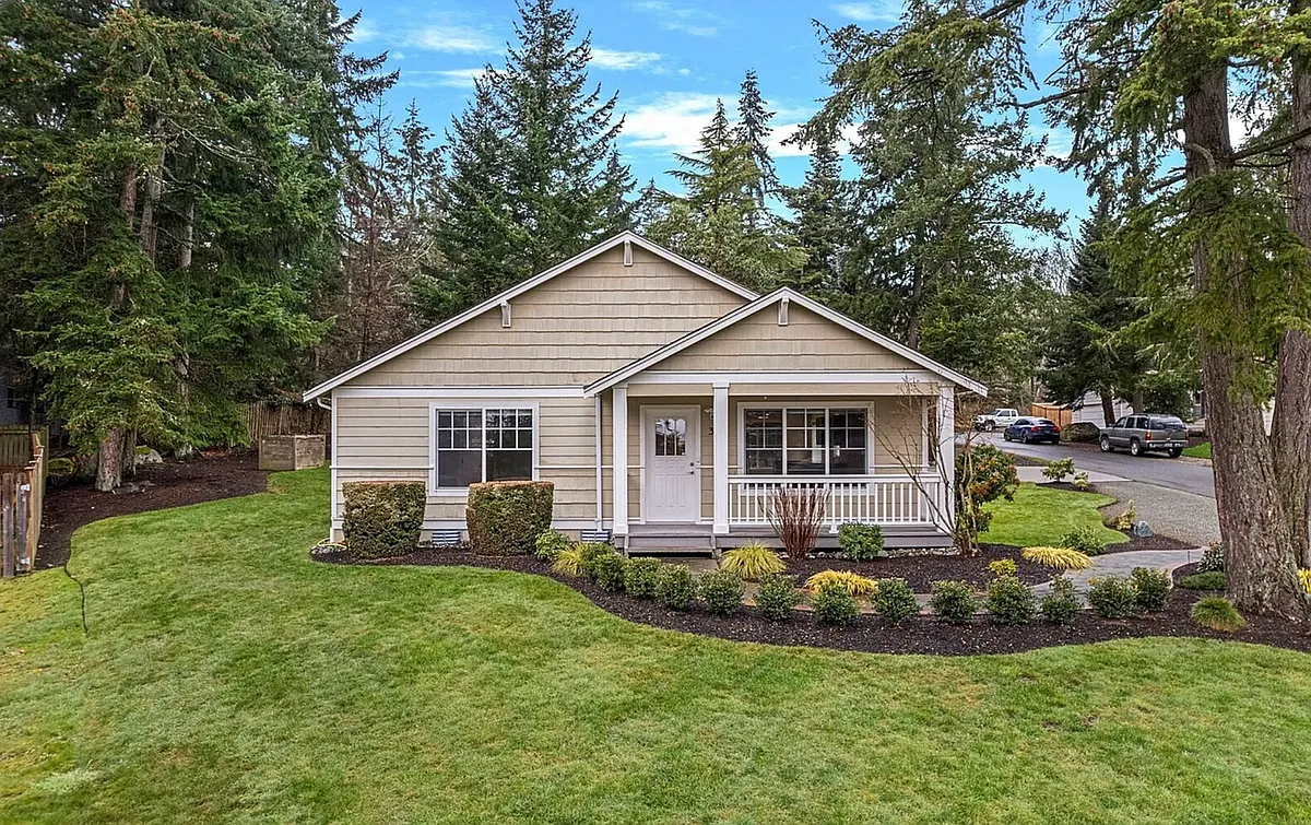 House Front (low maintenance yard/landscape) - unseen, is added Solar LED lighting - Walking INTO "This Door" - Home Layout is Primarily LEFT side 3 Beds/2 Baths, RIGHT side Common Spaces, Living, Kitchen and Dining areas - 398 Nooksack Pl