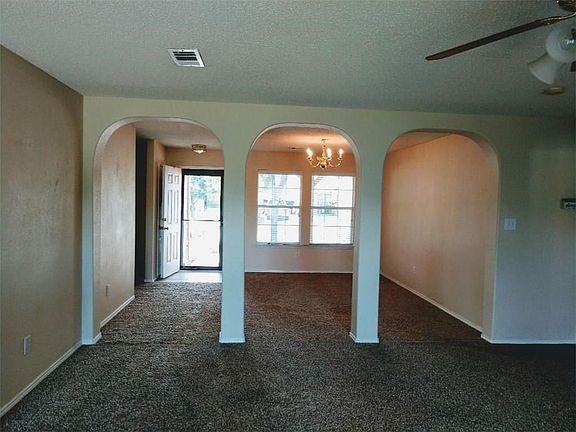 Front entry from dining room to living area.