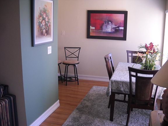 dining area with kitchen on left