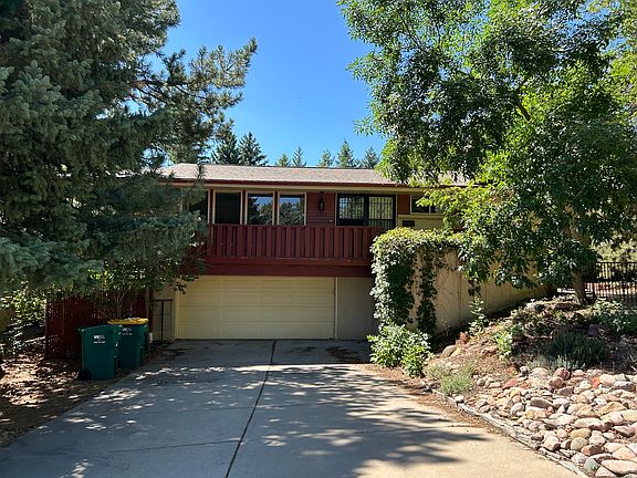 Many trees on property for shade, two car garage