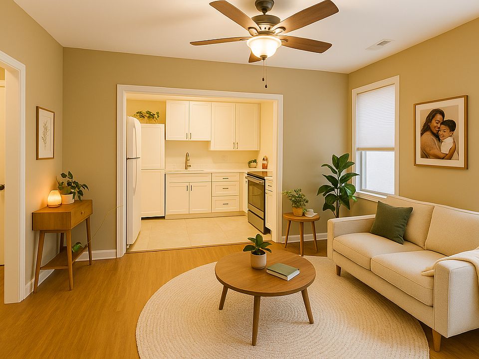 beautiful open spaces! Virtually staged to help show furniture placement options! Please note- Wood floors are a bit darker in person.