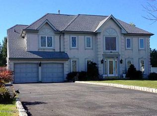 90 Essex Cir, Manalapan, NJ 07726