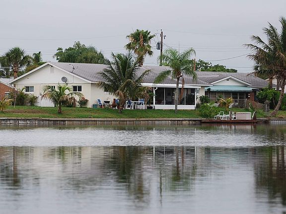 view of house from the water facing North