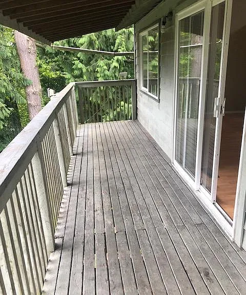 the bid covered deck off the grand room on the top floor with private territory view