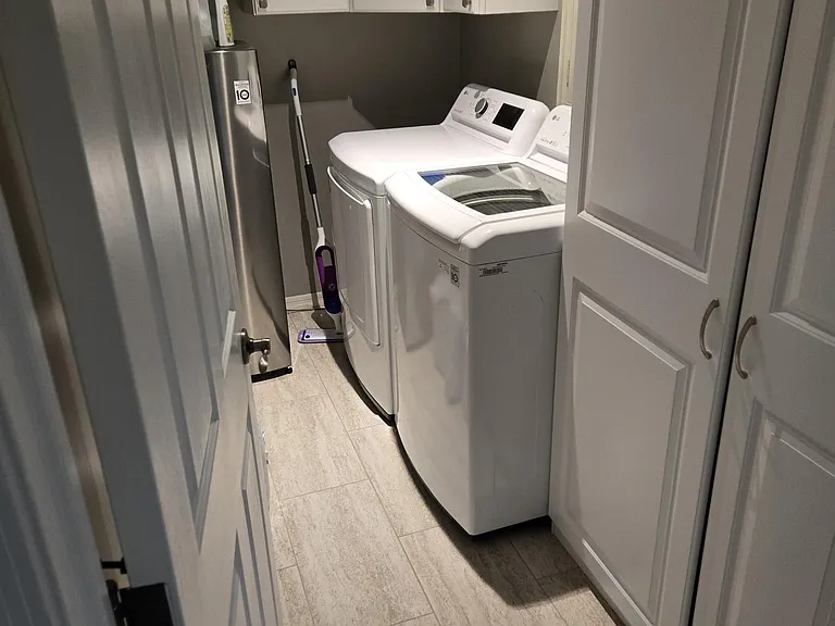 Laundry room, with extra freezer