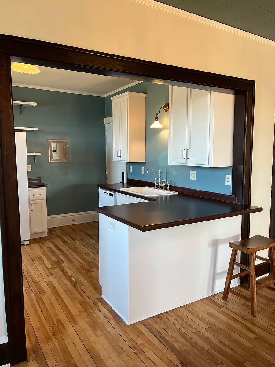 Kitchen view from Dining Room. - 415 1/2 E Saint Germain St #2