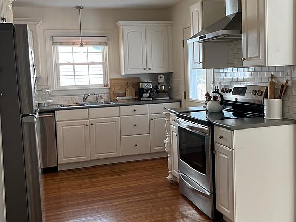 Updated kitchen with stainless steel appliances. Entire house has hardwood floors.