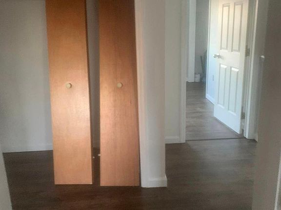 three bedrooms upstairs, all with new floors and paint