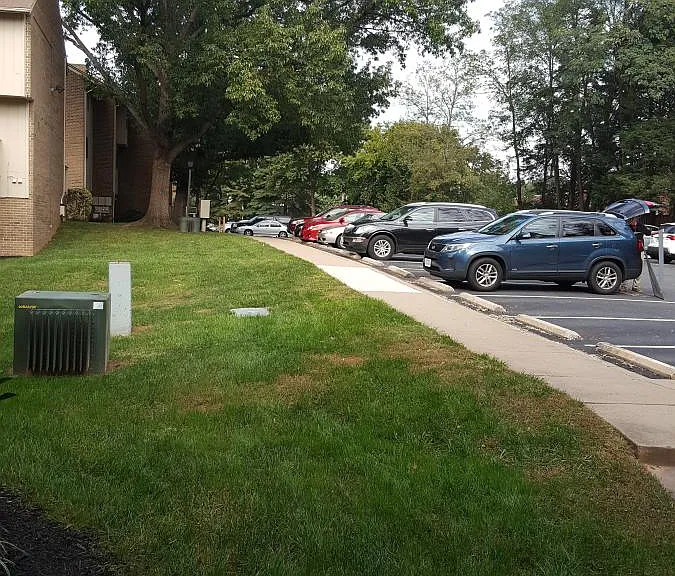 Condo parking lot with 1 reserved space