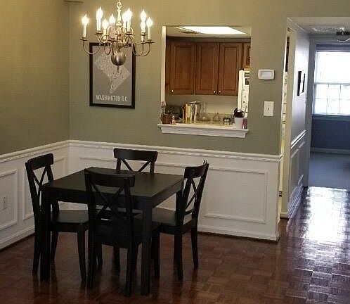 Beautiful living space with working fireplace and crown mold