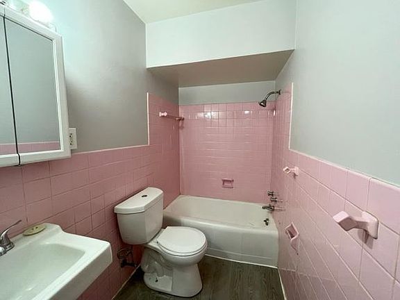 Bathroom with pink tile