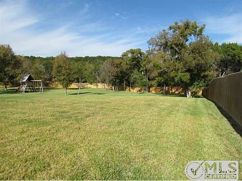 Wooded acre lot