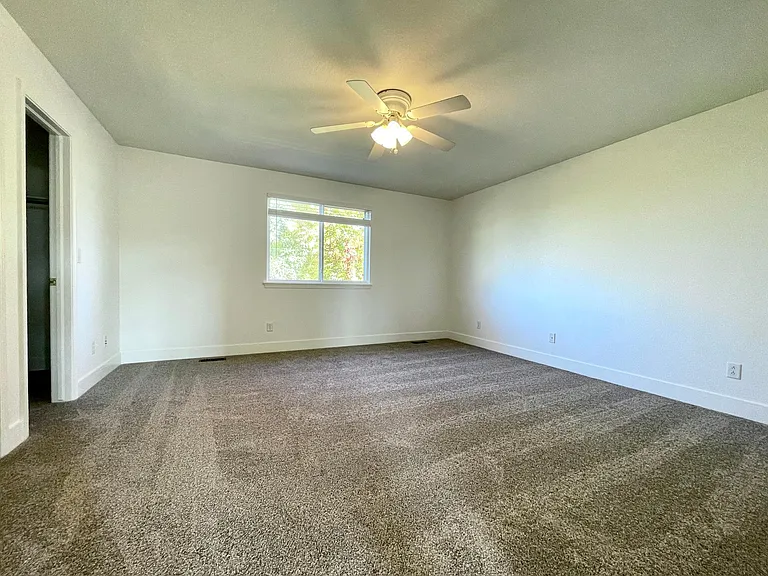 Master bedroom with greenbelt views