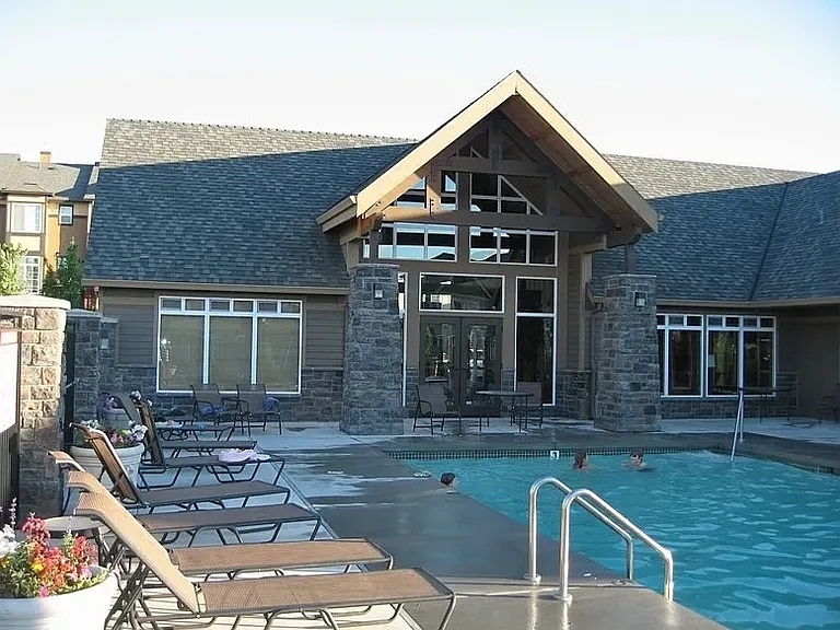 Community outdoor pool and lounge area.