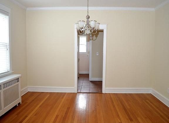 Spacious formal dining room with chandalier