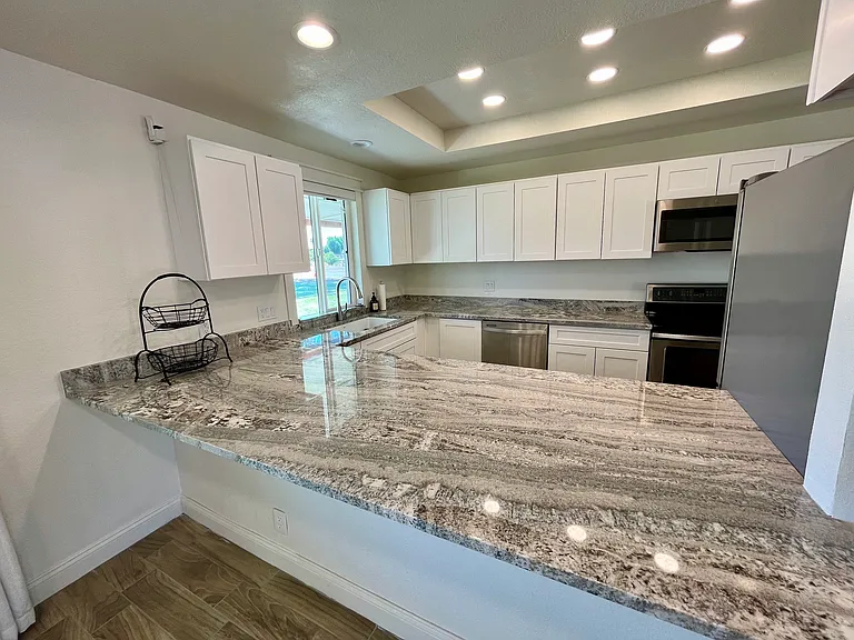 Big open kitchen. All new counters and cabinets, stainless appliances